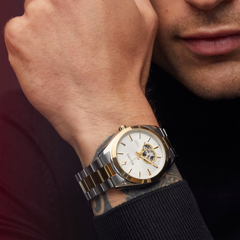 Bulova Surveyor Automatic Watch with Two-Tone Case and Open Heart Silver Dial #98A284 wrist