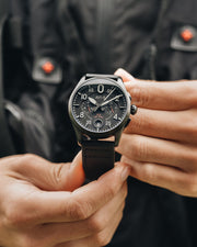 A 42mm case is inspired by the Spitfire's famous curved silhouette, with custom flowing pushers designed to complement this feature.