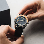 43mm diameter case crafted out of solid 316L stainless steel is framed by an updated bezel with a hardened glass bezel featuring a two tone finish.