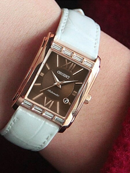 Orient Romance Women's Automatic Dress Watch with Curved Crystal and CZ Baguettes on the Bezel #ENRAP003T