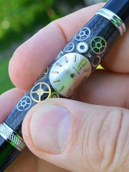 Artisan Crafted Collectable Pen made with an Omega dial and assorted gears, cogs, screws and bridges #WPP201BP