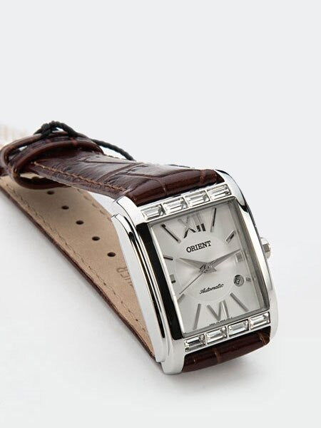 Orient Romance Women's Automatic Dress Watch with Curved Crystal and CZ Baguettes on the Bezel #ENRAP002W