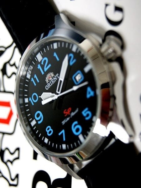 Orient Men's Leather Strap SP Series Quartz Watch with Black Easy Reader Dial #UNE4009B