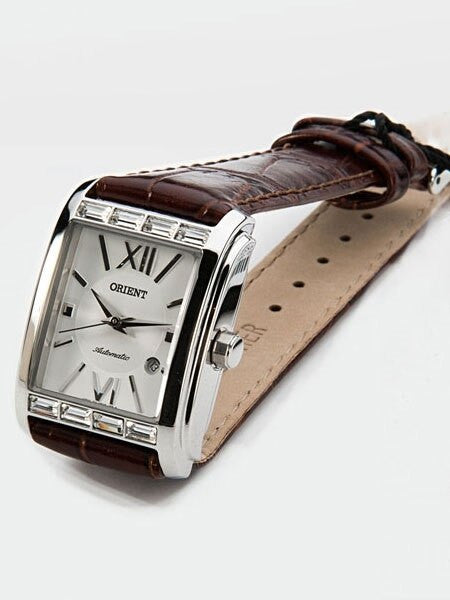 Orient Romance Women's Automatic Dress Watch with Curved Crystal and CZ Baguettes on the Bezel #ENRAP002W