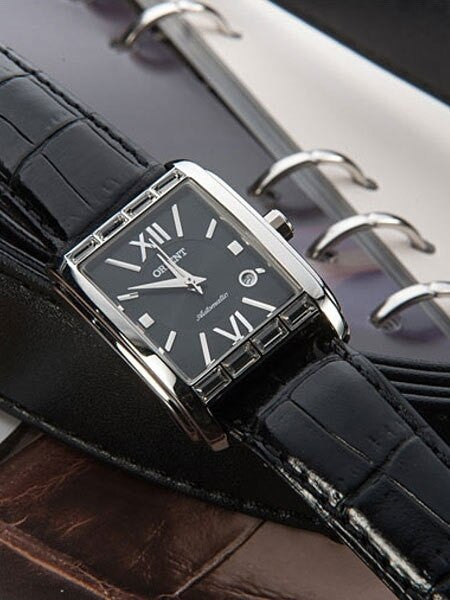 Orient Romance Women's Automatic Dress Watch with Curved Crystal and CZ Baguettes on the Bezel #ENRAP001B