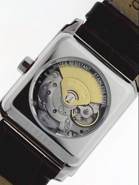 Orient Romance Women's Automatic Dress Watch with Curved Crystal and CZ Baguettes on the Bezel #ENRAP001B