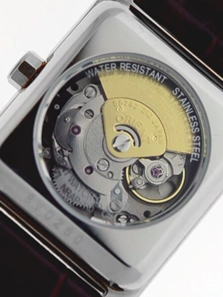 Orient Romance Women's Automatic Dress Watch with Curved Crystal and CZ Baguettes on the Bezel #ENRAP002W