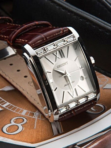 Orient Romance Women's Automatic Dress Watch with Curved Crystal and CZ Baguettes on the Bezel #ENRAP002W