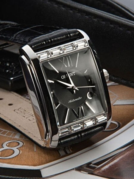Orient Romance Women's Automatic Dress Watch with Curved Crystal and CZ Baguettes on the Bezel #ENRAP001B