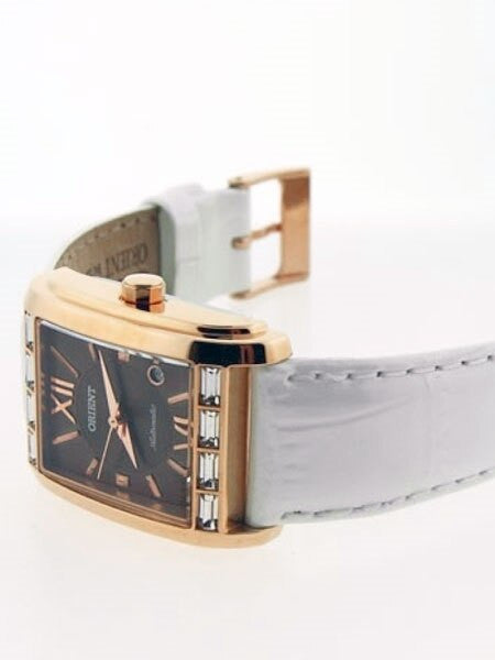Orient Romance Women's Automatic Dress Watch with Curved Crystal and CZ Baguettes on the Bezel #ENRAP003T