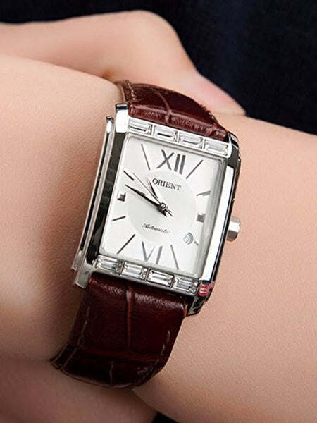 Orient Romance Women's Automatic Dress Watch with Curved Crystal and CZ Baguettes on the Bezel #ENRAP002W