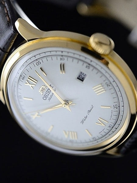 Orient Goldtone Automatic Dress Watch with White Dial, Roman Numerals #ER24009W